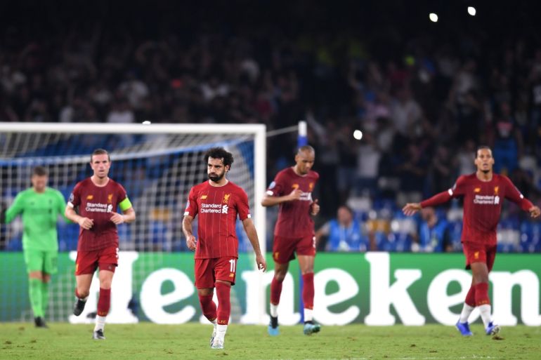 NAPLES, ITALY - SEPTEMBER 17: Mohamed Salah of Liverpool reacts as Napoli score their first goal during the UEFA Champions League group E match between SSC Napoli and Liverpool FC at Stadio San Paolo on September 17, 2019 in Naples, Italy. (Photo by Laurence Griffiths/Getty Images)