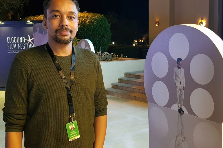 Sudanese film director Suhaib Gasmelbari looks on after an interview with Reuters at El Gouna Film Festival in Hurghada, Egypt, September 25, 2019. Picture taken September 25, 2019. REUTERS/Sameh Elkhatib