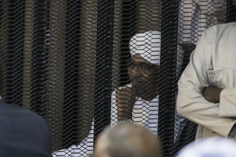 Omar al-Bashir's trial in Khartoum- - KHARTOUM, SUDAN - SEPTEMBER 7: Sudan's ousted President Omar al-Bashir sits in a defendant's cage during his trial of illegal acquisition and use of foreign funds in Khartoum, Sudan on September 7, 2019.