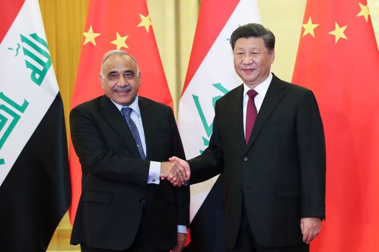 Chinese President Xi Jinping shakes hands with Iraqi Prime Minister Adil Abdul-Mahdi during their meeting at the Great Hall of the People in Beijing, China September 23, 2019. Lintao Zhang/Pool via REUTERS *** Local Caption *** Xi Jinping;Adil Abdul-Mahdi