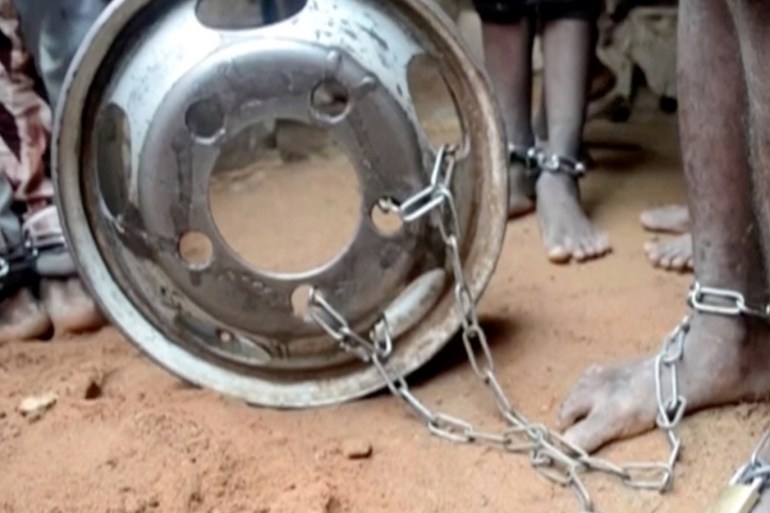 People with chained legs are pictured after being rescued from a building in the northern city of Kaduna, Nigeria September 26, 2019, in this grab obtained from a video. TELEVISION CONTINENTAL/Reuters TV via REUTERS ATTENTION EDITORS - THIS IMAGE HAS BEEN SUPPLIED BY A THIRD PARTY.NIGERIA OUT. TPX IMAGES OF THE DAY