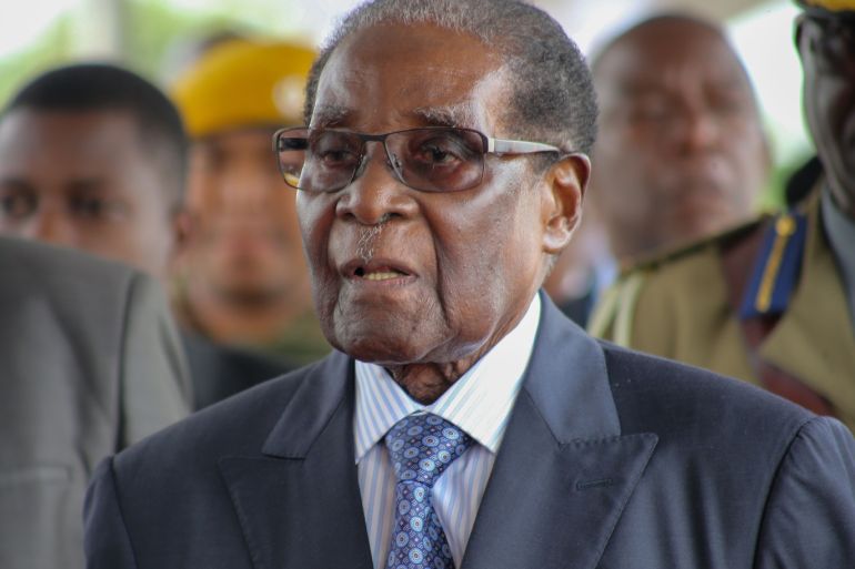 Robert Mugabe dead: Former Zimbabwe leader 'dies aged 95'- - HARARE, ZIMBABWE - (ARCHIVE): A file photo dated November 17, 2017 shows President of Zimbabwe Robert Mugabe attending at a graduation ceremony at the Zimbabwe Open University in Harare, Zimbabwe. Robert Mugabe has died aged 95 after battling ill health, it has been confirmed.