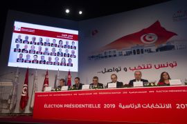 Tunisia: Saied, Karoui set for 2nd round polls- - TUNIS, TUNISIA - SEPTEMBER 17: Nabil Bafon (2nd R), the chairman of the Independent High Elections Commission of Tunisia, holds a press conference at the Conference Palace in the Tunisian capital Tunis on September 17, 2019. Kais Saied and Nabil Karoui will face off in the second round of Tunisia's presidential election, state election authorities said on Tuesday. According to official results released by the Independent High Electoral Commission, Saied led with 18.4% of the vote while Nabil Karoui had 15.6%.