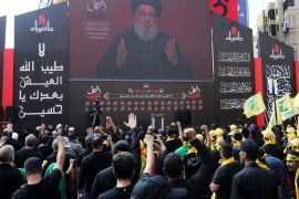 Lebanon's Hezbollah leader Sayyed Hassan Nasrallah gestures as he addresses his supporters via a screen during the religious procession to mark the Shi'ite Ashura ceremony, in Beirut, Lebanon September 10, 2019. REUTERS/Aziz Taher
