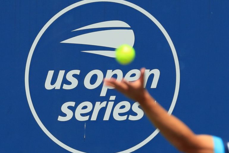 Aug 11, 2019; Mason, OH, USA; A view of the US Open Series logo as Marco Cecchinato (ITA) serves against Alex de Minaur (AUS) during the Western and Southern Open tennis tournament at Lindner Family Tennis Center. Mandatory Credit: Aaron Doster-USA TODAY Sports