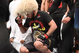 Sep 7, 2019; Abu Dhabi, UAE; Khabib Nurmagomedov (red gloves) reacts after defeating Dustin Poirier (not pictured) during UFC 242 at The Arena. Mandatory Credit: Per Haljestam-USA TODAY Sports