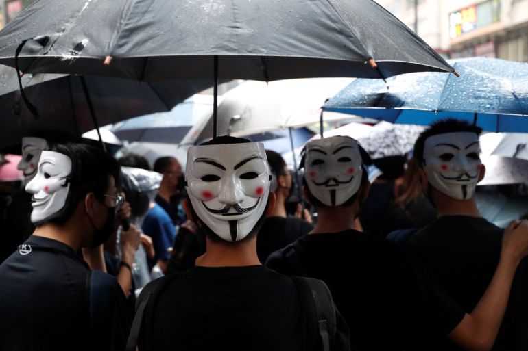 Protesters wearing masks gather during an anti-government rally at Causeway Bay, in Hong Kong, China October 6, 2019. REUTERS/Jorge Silva