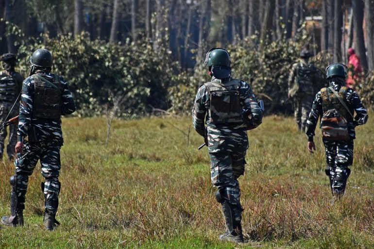 Three militants killed by Indian forces in Kashmir- - KASHMIR, INDIA - OCTOBER 16: Indian soldiers patrol near the site of encounter with militants in south Kashmir, India on October 16, 2019. Three militants were killed by Indian security forces in an encounter in Bijbehara area of Anantnag district. Uncertainty continues across Kashmir since India revoked Article 370 of its constitution which granted Kashmir autonomy.