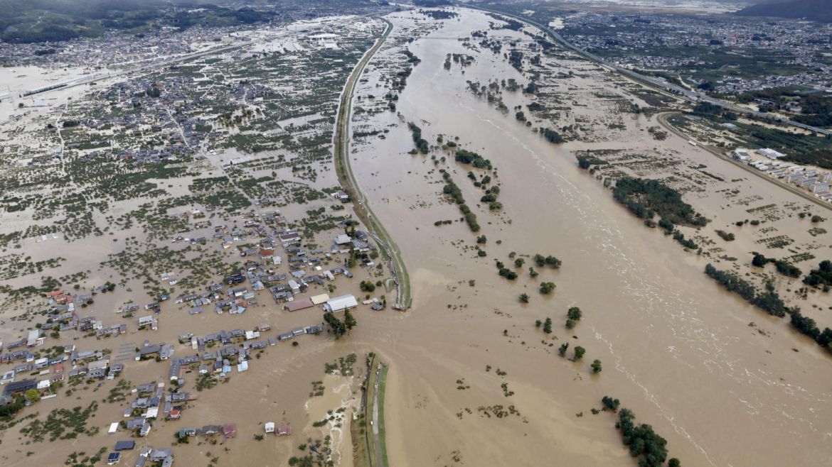 An aerial view shows residential areas flooded by the Chikuma river following Typhoon Hagibis in Nagano, central Japan, October 13, 2019, in this photo taken by Kyodo. Mandatory credit Kyodo/via REUTERS ATTENTION EDITORS - THIS IMAGE WAS PROVIDED BY A THIRD PARTY. MANDATORY CREDIT. JAPAN OUT.
