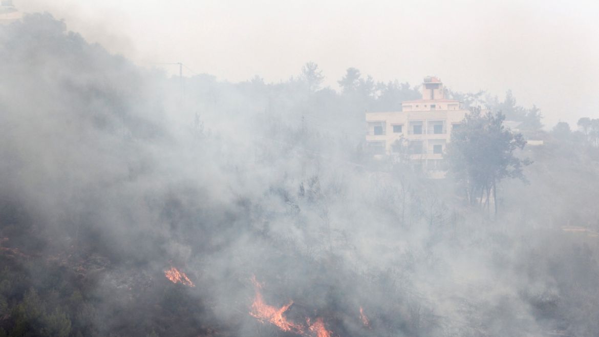 Wildfires burn near properties in Dibbiyeh village, south of Beirut, Lebanon October 15, 2019.   REUTERS/Aziz Taher