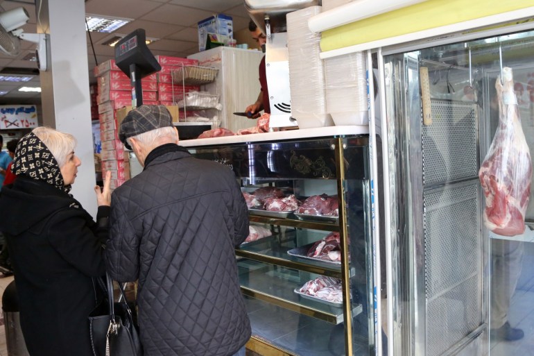 Imported red meat consumption in Iran- - TEHRAN, IRAN - FEBRUARY 12: Iranians buy meat from a butcher's shop, in Tehran, Iran on February 12, 2019. Iran has been importing red meat primarily from Brazil, Australia and Kyrgyzstan after livestock prices in Iran domestic market experienced a high rise.
