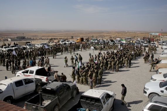 Syrian National Army reinforce Manbij front line- - ALEPPO, SYRIA - OCTOBER 08: Syrian National Army forces are dispatched to Manbij front line ahead of Turkey's planned operation in the east of the Euphrates River in northern Syria in Aleppo, Syria on October 08, 2019. The Syrian National Army, component of Syrian opposition forces, held the military exercise in Afrin, Syria, near the border with Turkey, to support Turkish Armed Forces, ahead of Turkey's planned oper