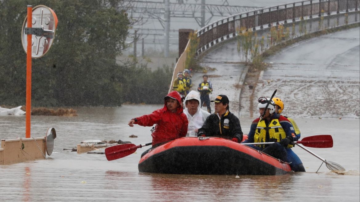 Rescue workers transport a resident in the aftermath of Typhoon Hagibis, which caused severe floods, near the Chikuma River in Nagano Prefecture, Japan, October 14, 2019. REUTERS/Kim Kyung-Hoon