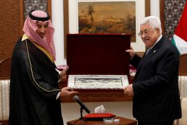 Palestinian President Mahmoud Abbas honors Saudi Football Federation Chief Yasser Almisehal in Ramallah, in the Israeli-occupied West Bank October 13, 2019. REUTERS/Mohamad Torokman