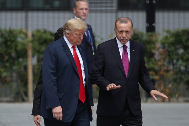 BRUSSELS, BELGIUM - JULY 11: U.S. President Donald Trump (L) and Turkish President Recep Tayyip Erdogan attend the opening ceremony at the 2018 NATO Summit at NATO headquarters on July 11, 2018 in Brussels, Belgium. Leaders from NATO member and partner states are meeting for a two-day summit, which is being overshadowed by strong demands by U.S. President Trump for most NATO member countries to spend more on defense. (Photo by Sean Gallup/Getty Images)