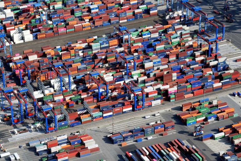 Aerial view of containers at a loading terminal in the port of Hamburg, Germany August 1, 2018. REUTERS/Fabian Bimmer
