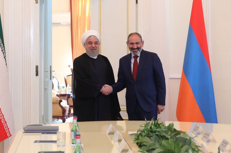 Iranian President Rouhani meets Armenian PM Pashinyan- - YEREVAN, ARMENIA - OCTOBER 01: (----EDITORIAL USE ONLY – MANDATORY CREDIT -