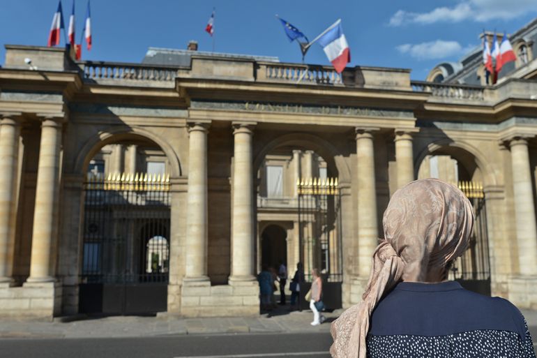 Is the ban of Burkini legal? The Council ofd State in France to decide. The debate started today at 3pm and its judgment will be delivered on Friday 26th August, at 3pm. In picture: a woman in front at Palais-Royal, home of the Council of State (French: Conseil d'Etat), a body of the French national government that acts both as legal adviser of the executive branch and as the supreme court for administrative justice on 25 August 2016, in Paris, France. (Photo by Artur Widak/NurPhoto via Getty Images)