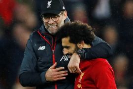Soccer Football - Premier League - Liverpool v Tottenham Hotspur - Anfield, Liverpool, Britain - October 27, 2019 Liverpool's Mohamed Salah celebrates with manager Juergen Klopp after the match Action Images via Reuters/Jason Cairnduff EDITORIAL USE ONLY. No use with unauthorized audio, video, data, fixture lists, club/league logos or