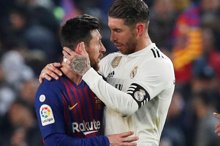 Soccer Football - Copa del Rey - Semi Final First Leg - FC Barcelona v Real Madrid - Camp Nou, Barcelona, Spain - February 6, 2019 Barcelona's Lionel Messi and Real Madrid's Sergio Ramos after the match REUTERS/Albert Gea