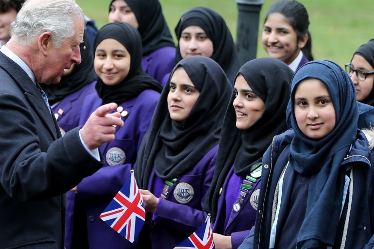 MANCHESTER, ENGLAND - APRIL 03: Prince Charles, Prince of Wales is greeted by local school children during an official visit to the British Muslim Heritage Centre on April 3, 2019 in Manchester, England. (Photo by Nigel Roddis/WPA Pool/Getty Images)