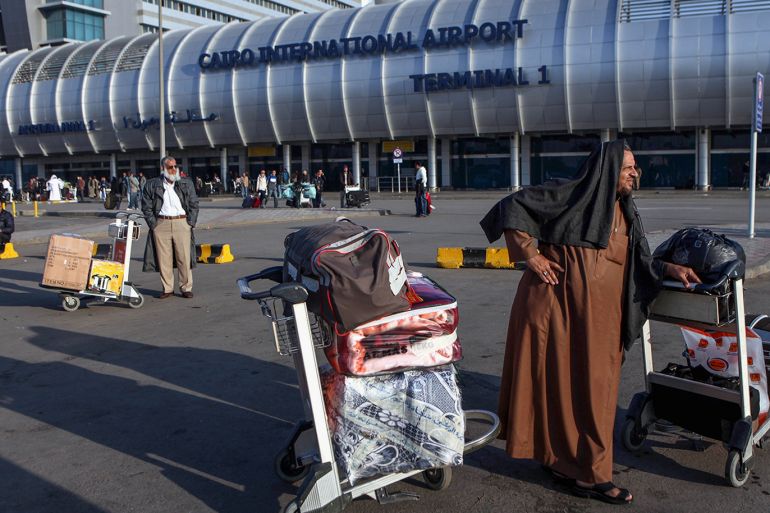 epa07730250 (FILE) - An Arab man stands next to his lagguage outside the airport in Cairo, Egypt, 31 January 2011 (Reissued 20 July 2019). According to reports on 20 July 2019, British Airways suspended all flights to and from Cairo International Airport temporarily for seven days pending security assessments. EPA-EFE/JIM HOLLANDER