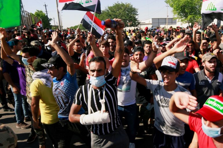 Demonstrators gather at a protest during a curfew, three days after the nationwide anti-government protests turned violent, in Baghdad, Iraq October 4, 2019. REUTERS/Alaa al-Marjani