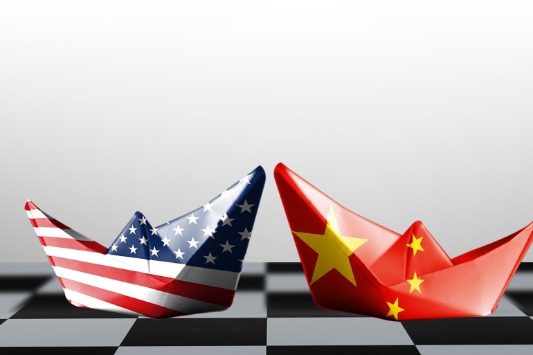 USA flag and China flag print screen on ship with white background.It is symbol of tariff trade war tax barrier between United States of America and China.-Image.