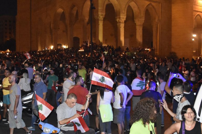 Anti-government protests continue in Lebanon- - BEIRUT, LEBANON - OCTOBER 19: Lebanese demonstrators gather at Martyrs' Square during an anti-government protest against dire economic conditions and new tax regulations on messaging services like Whatsapp, in front of the Mohammad Al-Amin Mosque in Beirut, Lebanon on October 19, 2019.