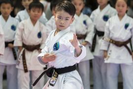 TOKYO, JAPAN - JULY 24: A boy demonstrates a Karate kata during an event marking one year before the start of the Tokyo 2020 Olympic Games on July 24, 2019 in Tokyo, Japan. (Photo by Tomohiro Ohsumi/Getty Images)