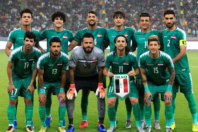 Soccer Football - FIFA World Cup 2022 Qualifier - Group C - Iraq v Hong Kong - Basra Sports City Stadium, Basra, Iraq - October 10, 2019 Iraq players pose for a team group photo before the match REUTERS/Thaier Al-Sudani