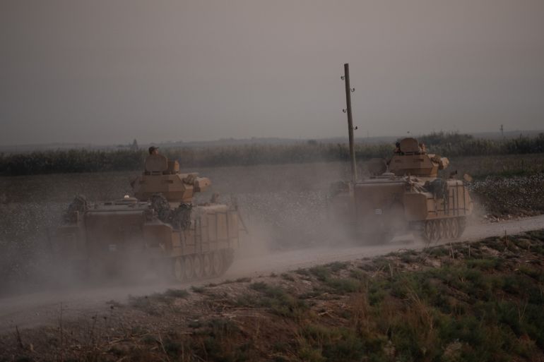 AKCAKALE, TURKEY - OCTOBER 09: Turkish armored vehicles prepare to cross the border into Syria on October 09, 2019 in Akcakale, Turkey. The military action is part of a campaign to extend Turkish control of more of northern Syria, a large swath of which is currently held by Syrian Kurds, whom Turkey regards as a threat. U.S. President Donald Trump granted tacit American approval to this campaign, withdrawing his country's troops from several Syrian outposts near the Turkish border. (Photo by Burak Kara/Getty Images)