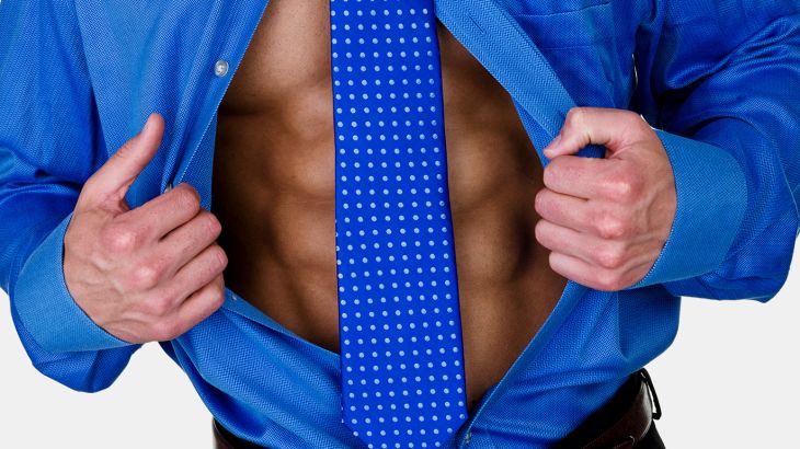 Man wearing a suit opening his shirt to show his 6 pack abs - بطن مسطح