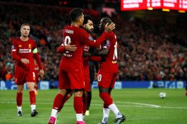 Soccer Football - Champions League - Group E - Liverpool v FC Salzburg - Anfield, Liverpool, Britain - October 2, 2019 Liverpool's Mohamed Salah celebrates scoring their third goal with team mates Action Images via Reuters/Jason Cairnduff