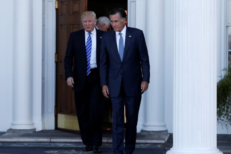 U.S. President-elect Donald Trump (L) and former Massachusetts Governor Mitt Romney (R) emerge after their meeting at the main clubhouse at Trump National Golf Club in Bedminster, New Jersey, U.S., November 19, 2016. REUTERS/Mike Segar