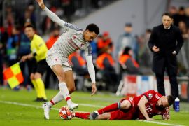 Soccer Football - Champions League - Round of 16 Second Leg - Bayern Munich v Liverpool - Allianz Arena, Munich, Germany - March 13, 2019 Liverpool's Trent Alexander-Arnold in action with Bayern Munich's Franck Ribery as Bayern Munich coach Niko Kovac looks on Action Images via Reuters/Andrew Boyers