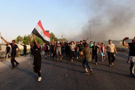 شوارع بغداد تبدو خالية بعد فرض حظر للتجول