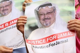 Press Briefing on Jamal Khashoggi- - WASHINGTON, USA - OCTOBER 10: A member of the Organization 'Justice for Jamal Khashoggi' holds a picture of Khashoggi as she and other members hold news conference for disappearance of Saudi journalist in front of The Washington Post headquarters in Washington D.C. with the attendance of Congressman Gerry Connolly and figures from CAIR and Pen America spoke, in Washington D.C., United States on October 10, 2018.