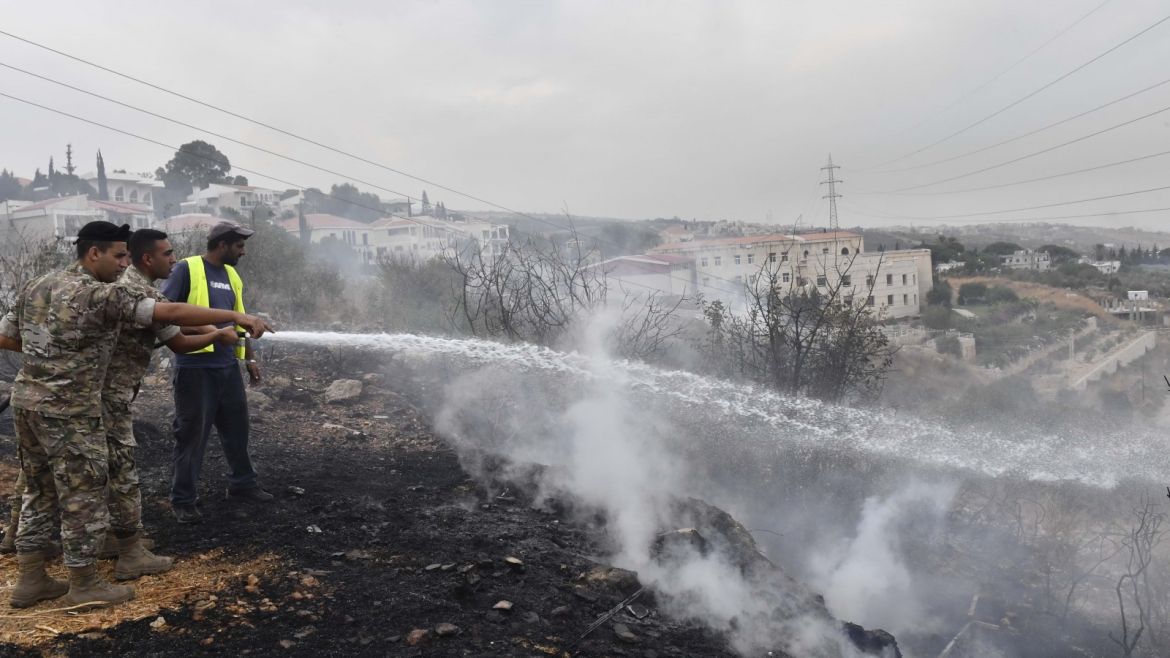 Wildfire in Lebanon- - BEIRUT, LEBANON - OCTOBER 15: Security forces extinguish fire after fire took out forests in the mountainous area that flank Damour river near the village of Meshref in Lebanon's Shouf mountains, southeast of the capital Beirut, Lebanon on October 15, 2019. Flames devoured large swaths of land in several Lebanese and Syrian regions. The outbreak coincided with high temperatures and strong winds, according to the official media in both countries.