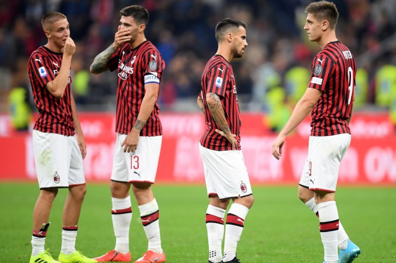 Soccer Football - Serie A - AC Milan v Inter Milan - San Siro, Milan, Italy - September 21, 2019 AC Milan players look dejected after the match REUTERS/Daniele Mascolo