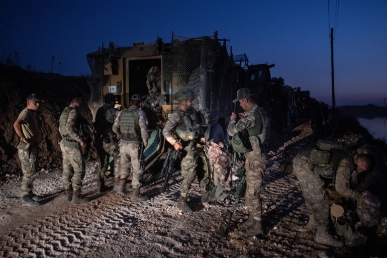 AKCAKALE, TURKEY - OCTOBER 09: First group of Turkish infantry prepare to enter Syria on the border between Turkey and Syria on October 09, 2019 in Akcakale, Turkey. The military action is part of a campaign to extend Turkish control of more of northern Syria, a large swath of which is currently held by Syrian Kurds, whom Turkey regards as a threat. U.S. President Donald Trump granted tacit American approval to this campaign, withdrawing his country's troops from sever