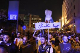 Protest against the government in Lebanon- - BEIRUT, LEBANON - OCTOBER 21: People gather to stage a protest against the government's policy on easing the economical crisis in Beirut, Lebanon on October 21, 2019.