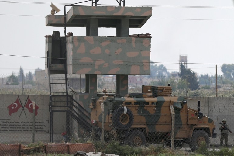 A Turkish military vehicle is pictured in the Turkish-Syrian border town of Akcakale, Turkey, October 20, 2019. REUTERS/StoyanÊNenov