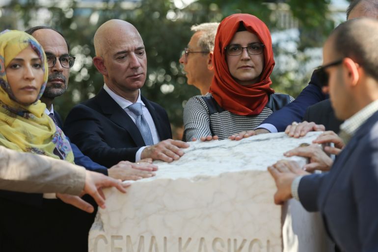 Commemoration ceremony to mark first anniversary of Khashoggi’s murder in Istanbul- - ISTANBUL, TURKEY - OCTOBER 02: The fiancee of murdered Saudi Arabian journalist Jamal Khashoggi, Hatice Cengiz (4th L), Amazon CEO Jeff Bezos (3rd L), Nobel Peace Prize Winner Tawakkol Karman (2nd L) and Publisher and chief executive officer of The Washington Post Fred Ryan (not seen) attend the opening ceremony of Jamal Khashoggi's monument with his name, birth and death date in front of the Saudi consulate on the first anniversary of his murder, in Istanbul, Turkey on October 02, 2019.