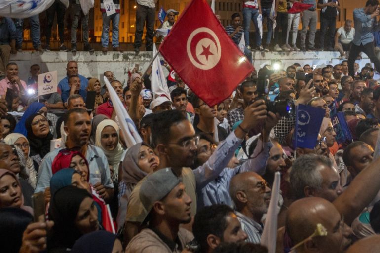 Tunisia's parliamentary elections- - TUNIS, TUNISIA - OCTOBER 06: Nahda Movement supporters celebrate after the first announcement of early election results following the parliamentary elections in Tunis, Tunisia on October 06, 2019. Around 7.1 million Tunisians were eligible to cast ballot in polls to elect the 217-member assembly.
