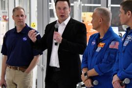 (L-R) NASA Administrator Jim Bridenstine, SpaceX Chief Engineer Elon Musk, NASA astronauts Doug Hurley and Bob Behnken, take questions from the media after a tour of SpaceX headquarters in Hawthorne, California, U.S. October 10, 2019. REUTERS/ Gene Blevins