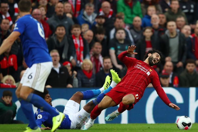 LIVERPOOL, ENGLAND - OCTOBER 05: Hamza Choudhury of Leicester City collides with Mohamed Salah of Liverpool during the Premier League match between Liverpool FC and Leicester City at Anfield on October 05, 2019 in Liverpool, United Kingdom. (Photo by Clive Brunskill/Getty Images)