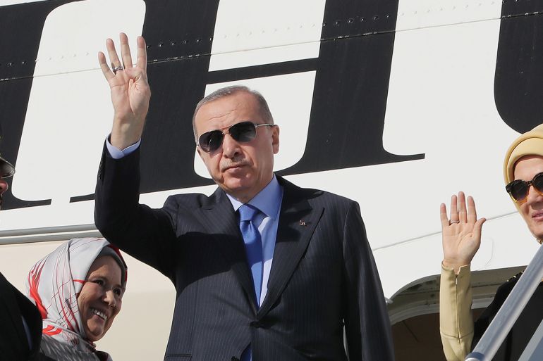 Turkish President Tayyip Erdogan waves as he boards his plane at Esenboga International Airport in Ankara, Turkey, November 12, 2019. Murat Cetinmuhurdar/Presidential Press Office/Handout via REUTERS ATTENTION EDITORS - THIS PICTURE WAS PROVIDED BY A THIRD PARTY. NO RESALES. NO ARCHIVE