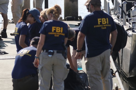 SANTA BARBARA, CALIFORNIA - SEPTEMBER 04: FBI personnel gather on a jetty by FBI Dive Team boats in Santa Barbara Harbor on September 4, 2019 in Santa Barbara, California. Authorities announced that the bodies of 33 victims have been recovered after the commercial scuba diving ship Conception caught fire and later sank, while anchored near Santa Cruz Island, in the early morning hours of September 2. Five crew members survived. Mario Tama/Getty Images/AFP== FOR NEWSPAPERS, INTERNET, TELCOS & TELEVISION USE ONLY ==