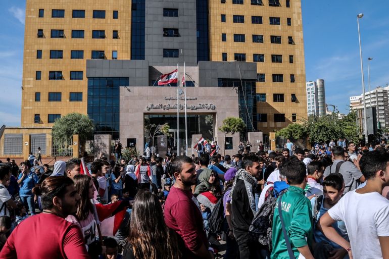 Lebanese students from various schools shout slogans and burn history books during ongoing anti-government protests in front the Education Ministry in Beirut, Lebanon 21 November 2019. Nationwide anti-government protests continue in Lebanon since 17 October, as protesters aim to apply pressure on the country's political leaders over what they view as a lack of progress following the prime minister's resignation on 29 October. EPA-EFE/NABIL MOUNZER